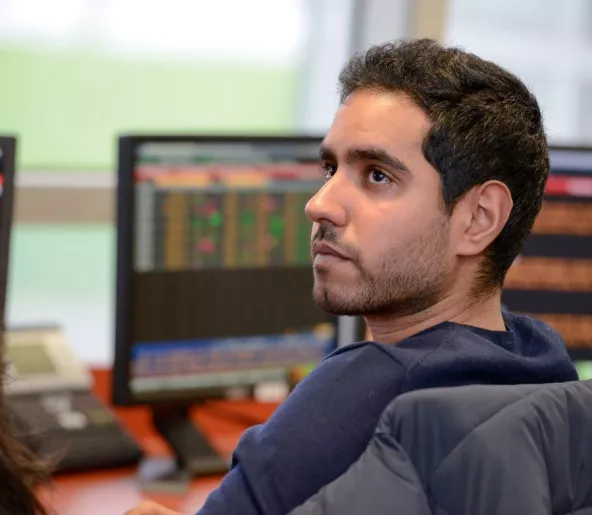 A student in the trading room