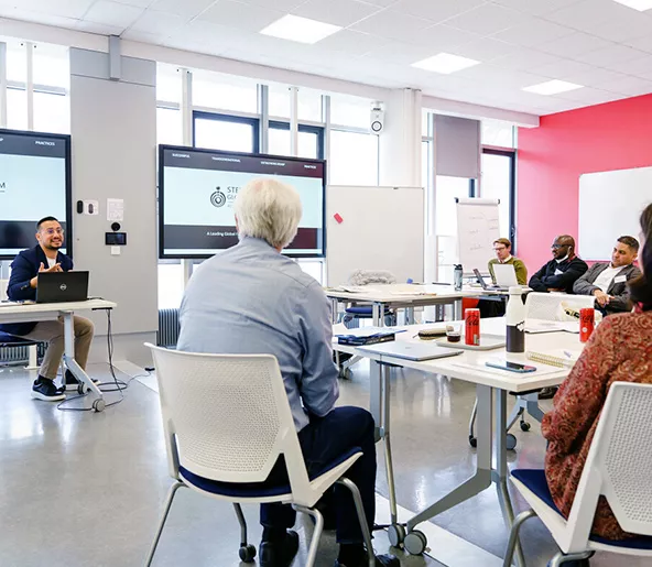 Audencia - Individuals interacting in a research center