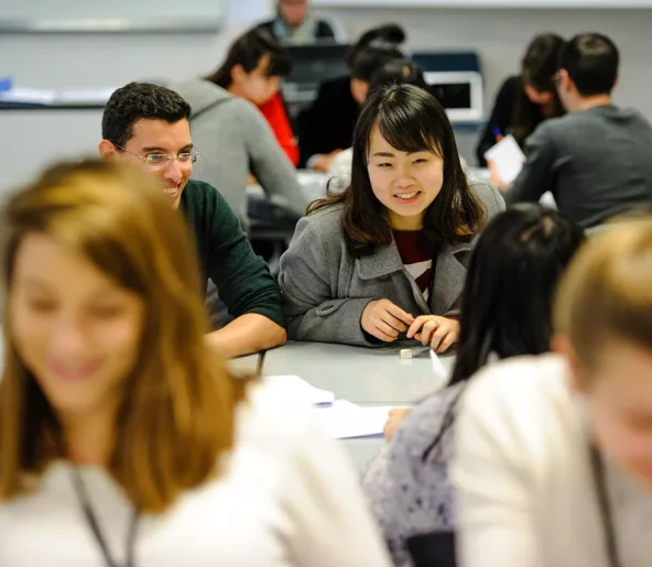 Students laughing in a classroom